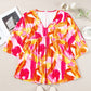 Orange Abstract Print 3/4 Sleeve V Neck Ruffled Babydoll Blouse